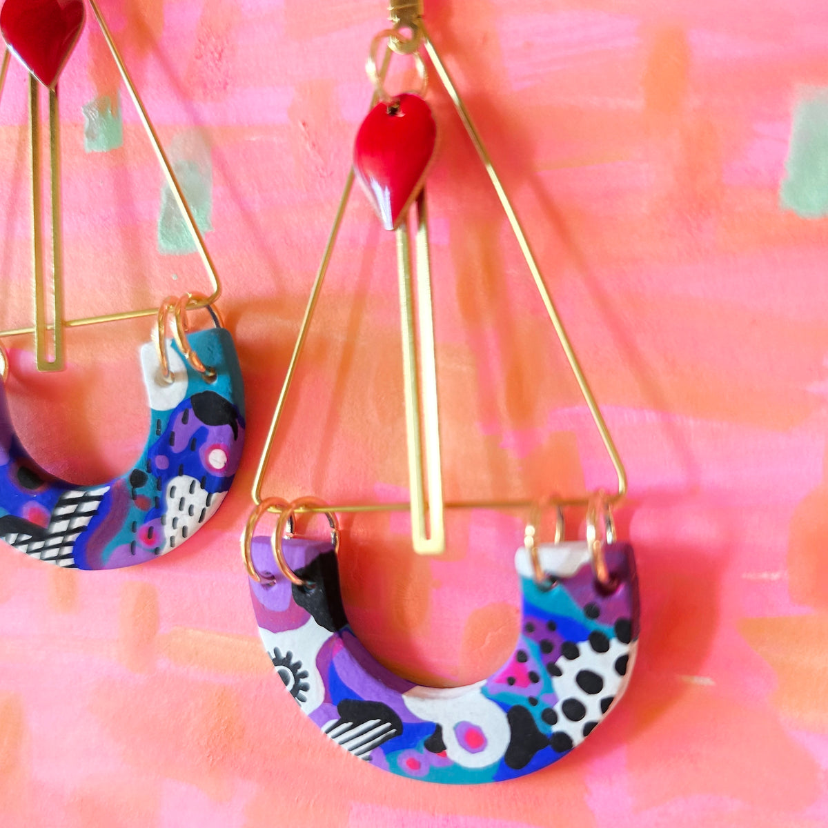 Boucles d'oreilles pendantes violette