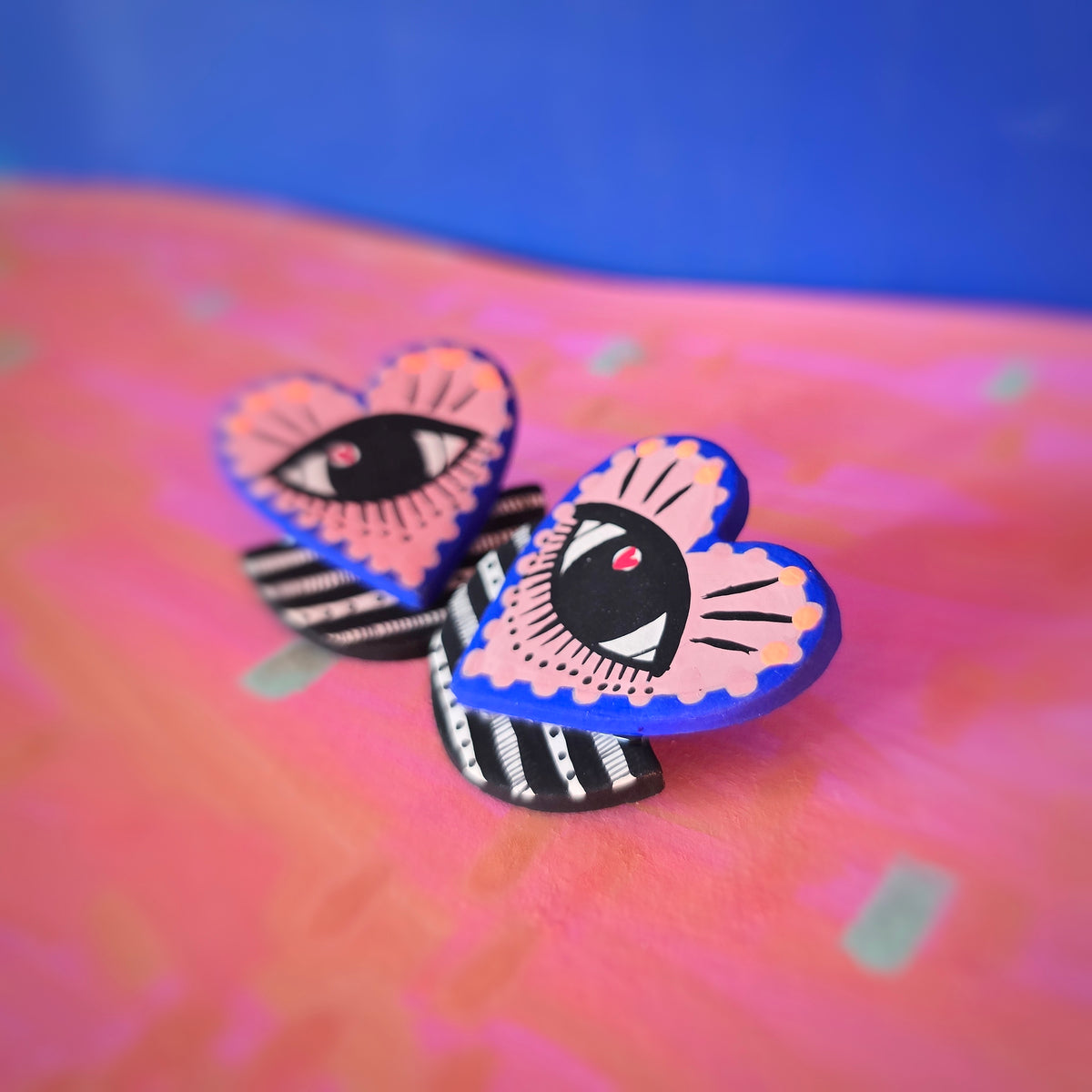 Boucles d'oreilles "eye" rose
