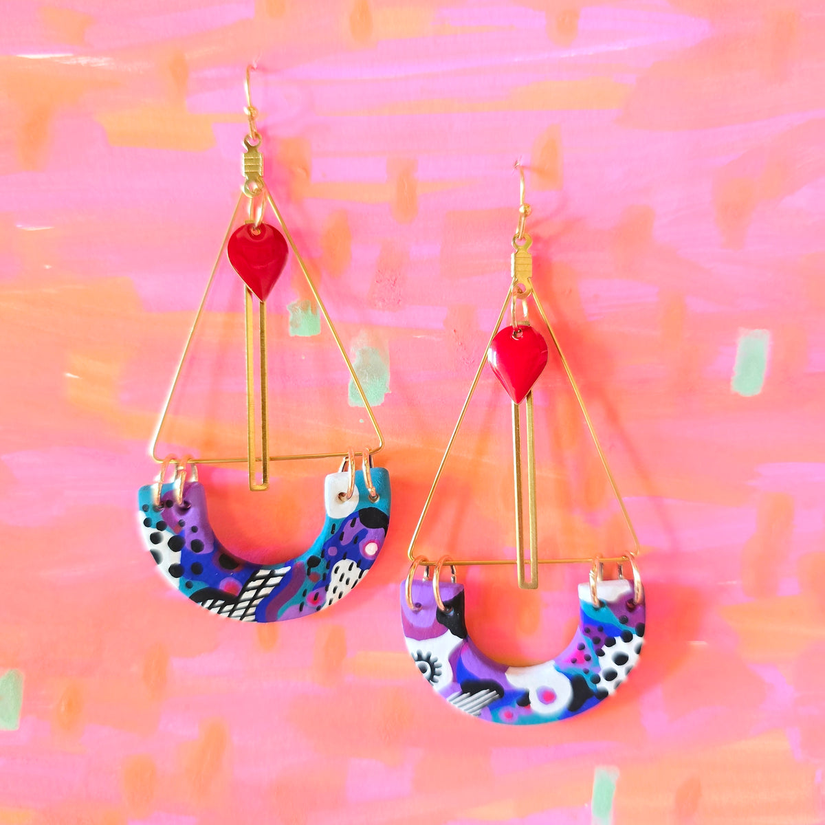 Boucles d'oreilles pendantes violette