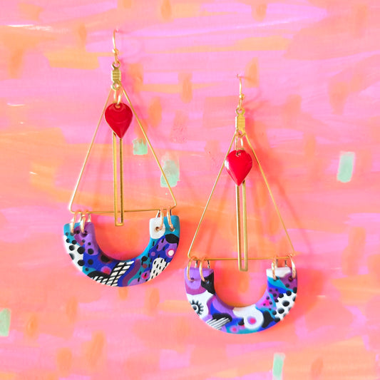 Boucles d'oreilles pendantes violette